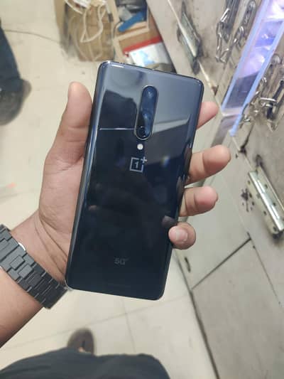 (  one plus 8 5G ) (. 8/128 GB PTA approved 10 by 9.5 alll okey