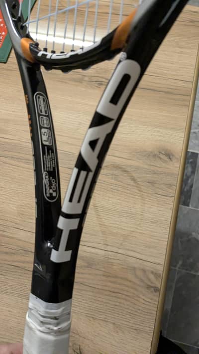 Long Tennis Racket Head & Wilson's