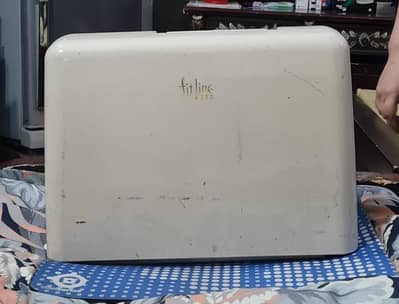 A Fitline Singer Sewing Machine Electric