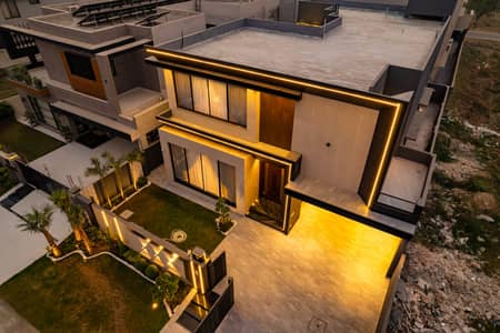 SEMI FURNISHED 1 KANAL ELEGANT AND BRAND NEW SUPER HOT LOCATED BUNGALOW IS AVAILABLE IN THE BEST BLOCK OF DHA LAHORE.