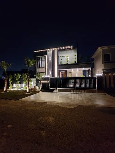 BRAND NEW 1-KANAL ELEGANT AND FULLY FURNISHED SUPER HOT LOCATED BUNGALOW IS AVAILABLE IN THE BEST BLOCK OF DHA LAHORE.