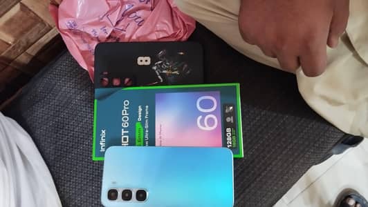 Infinix hot 60 pro . . . 8. . 128. . . 10.10