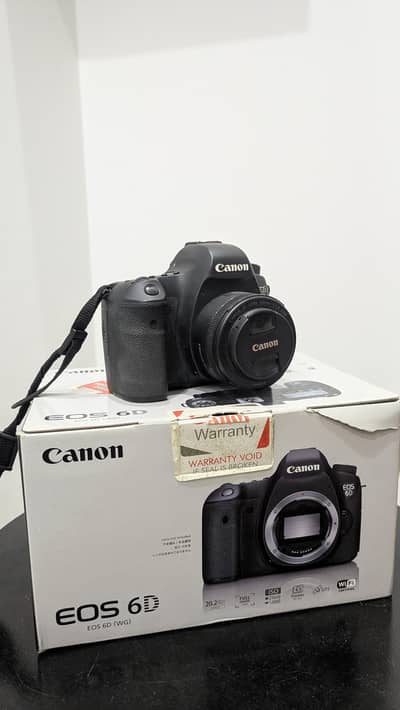 Canon 6D with 50mm 1.8 STM and 24-70 2.8