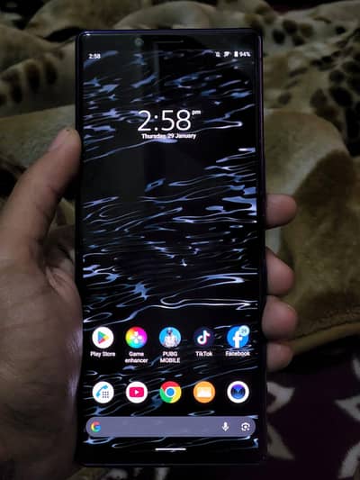 Sony Experia 1 with sim time , shade and dot