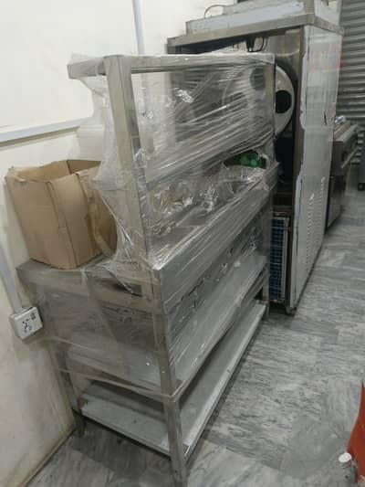 Restaurant Equipments like Oven, Pizza Table, Chillers etc