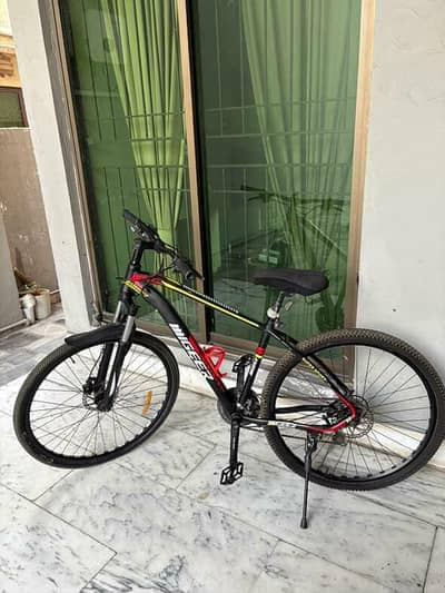 migeer 29 inch cycle with oill brakes and 3 front 7 back gears
