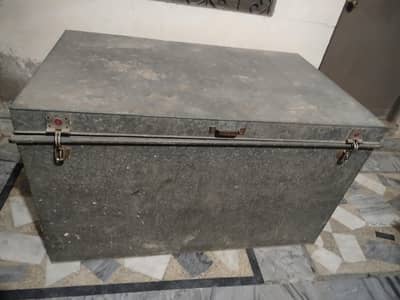 heavy iron  trunk ( paiti ), used for storage