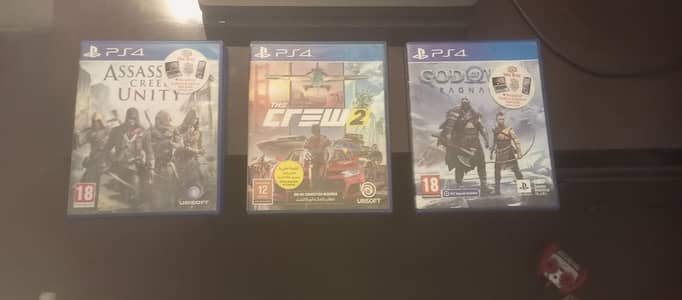 GOD OF WAR RAGNAROK and CREW 2 and AC UNITY games of PS4 available