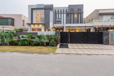 D H A Lahore 1 Kanal Brand New Mazher Munir Design House Full Basement With 100% Original Pics Available For Rent