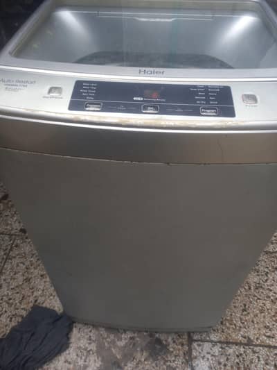 HAIER. . FULLY AOUTOMATIC. . 9.5. KG. . . TOTAL ORIGIONAL. PANEIL. NEEAT CALEEN