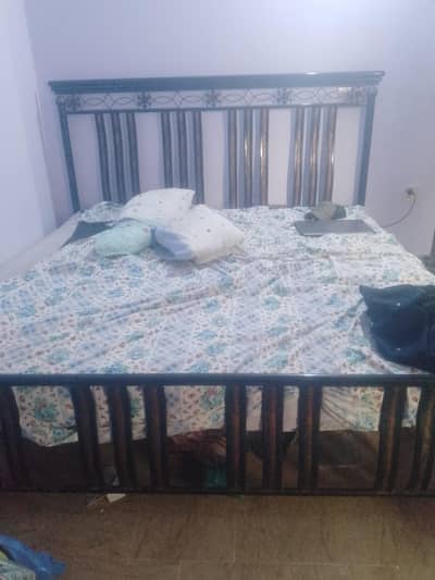 Iron bed without mattress