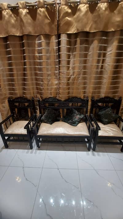 jet black wooden sofa set with tables