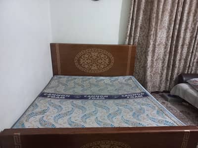 double bed with mattress is available for sale