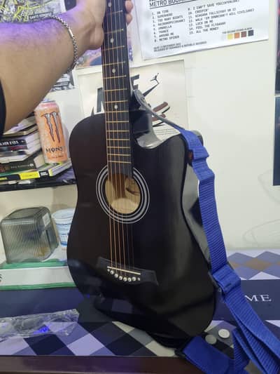 black acoustic guitar