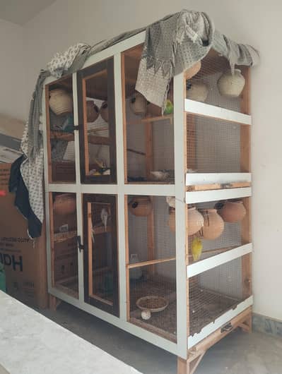 wooden cage for sale with birds and accessories