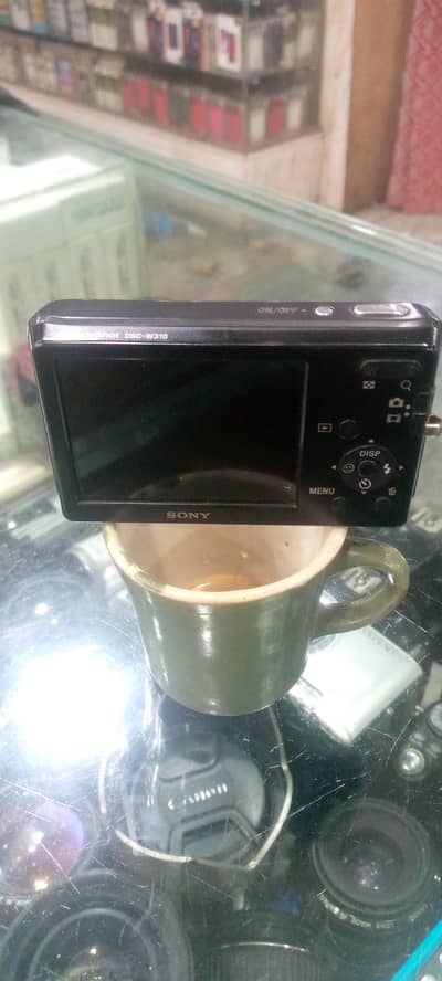 Sony w 310 digital camera like new battery cherger