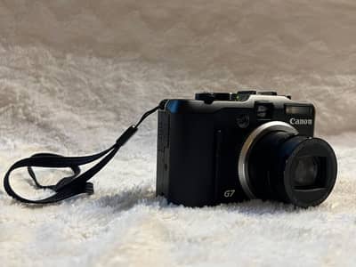 Canon J7 - Original Camera  "just camera with 32 gb memory card"