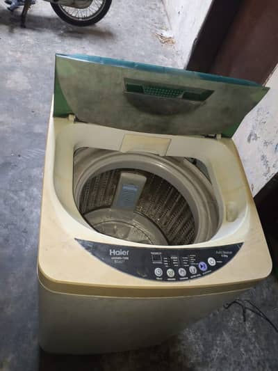 haier 8.5 kg or dawalance bhi taqreban 9kg