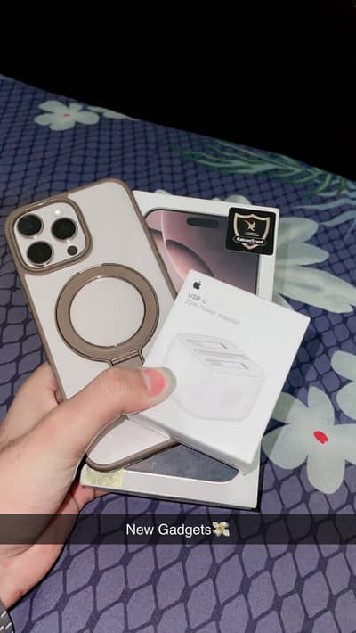 Iphone 16 pro max with 4 case brandnew and 20w apple orignal adopter