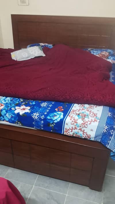 king size bed with one side table