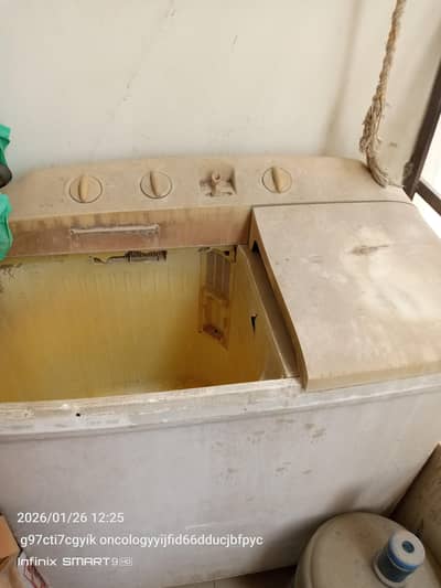 Double washing machine with spinner