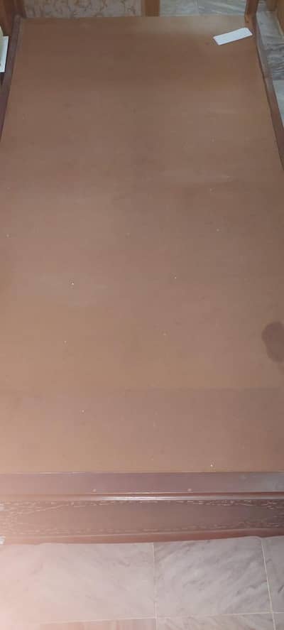 Two single beds made of tali