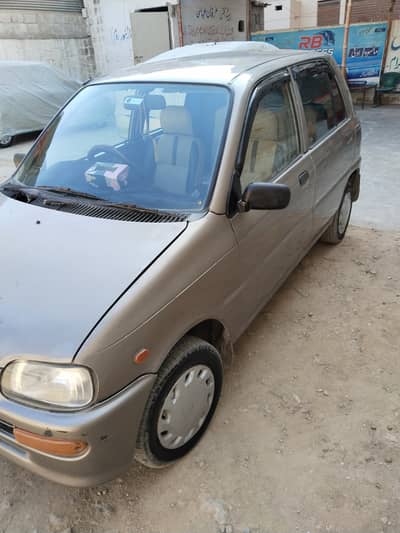 Daihatsu Coure  2009