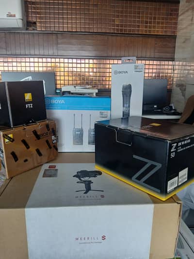 Nikon Z50 Mirrorless Camera Kit, Adapter  ,gamble,lens,microphone,