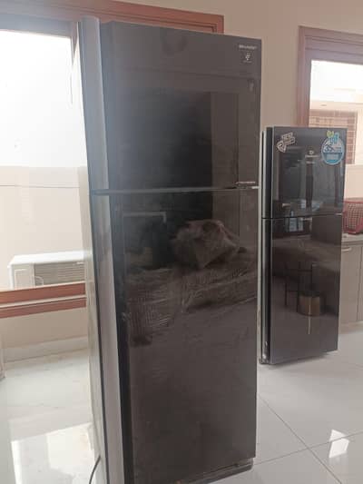 2 fridges for sell sharp and dawlance