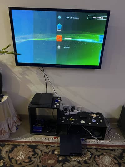 PS3 Console with three controllers