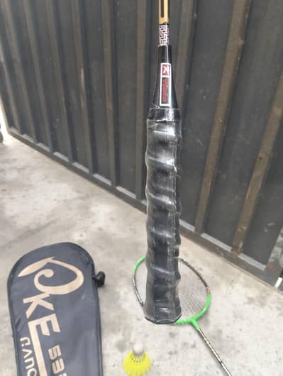 Badminton one month used with original bag with one 500 shuttle free