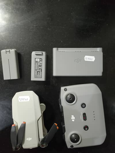 DJI Mini Remote and 02 batteries with charger