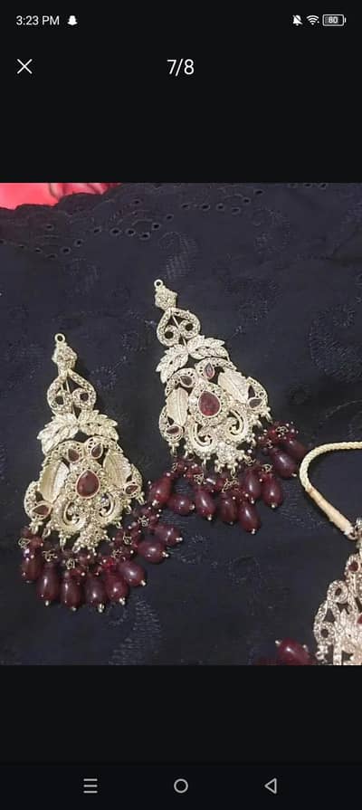 One time used dress with jewellery,