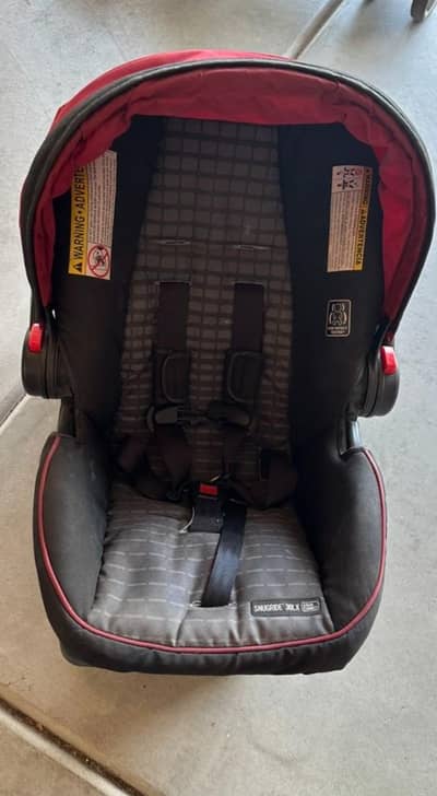Graco Snugride 30LX Car Seat and Graco LiteRider LX stroller.