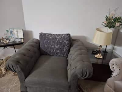 7 seater , grey black sofa set , elegant design , good condition