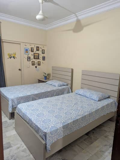 2 single beds without mattress