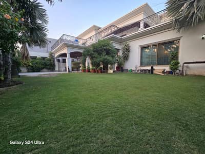 2 Kanal Slightly Used Spanish Design Well Maintained 8-Bedroom Full Basement Bungalow For Sale at Prime Location of DHA Lahore Near To Park Masjid & Commercial Market .