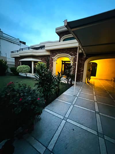 2 Kanal Slightly Used Spanish Design Most Beautiful Bungalow For Sale At Prime Location Of DHA Lahore Near To Park Masjid & Commercial Market.