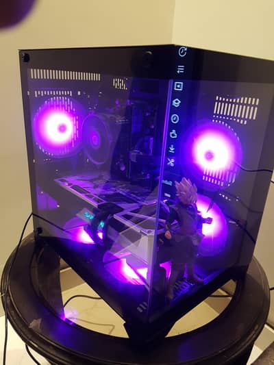 Intel i7 | RX 5700XT | PC with Goku figurine.
