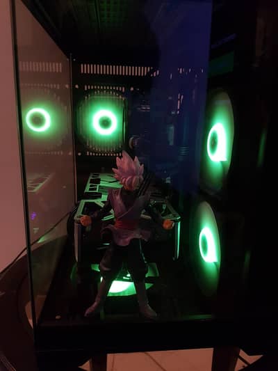 Intel i7 | RX 5700XT | PC with Goku figurine.