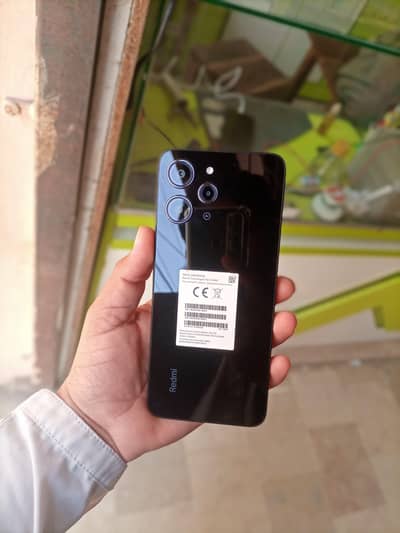 “Redmi 12 8/128 PTA Approved – Excellent Condition