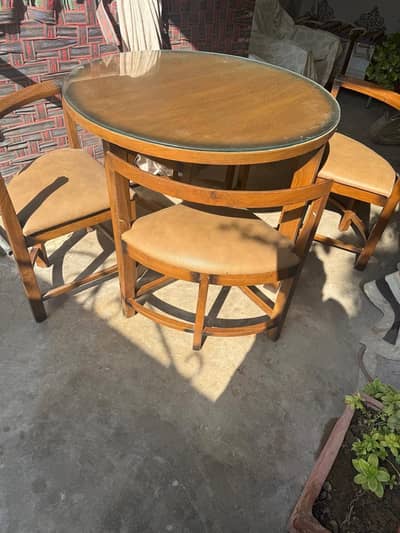 Round dining table with glass top