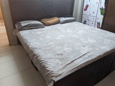 Selling Bed with mattress and cupboard