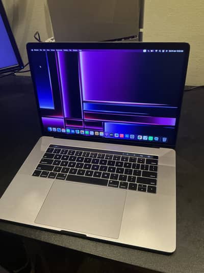 MacBook Pro i7 15 inch with tach bar