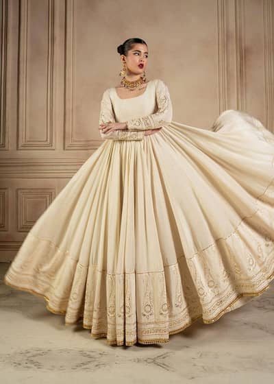 designer Lvory lehnga cholio with heavy sequin dupatta