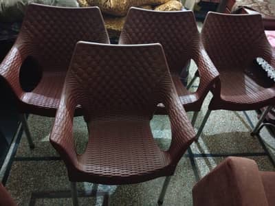 solid plastic table with four chair for sale