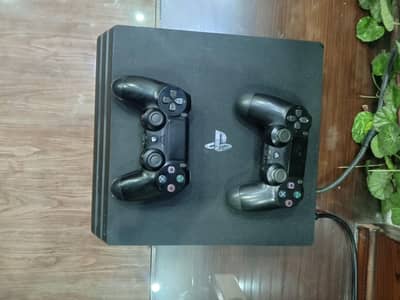 PS4 Pro 1 tb 2 controllers 20+ games installed