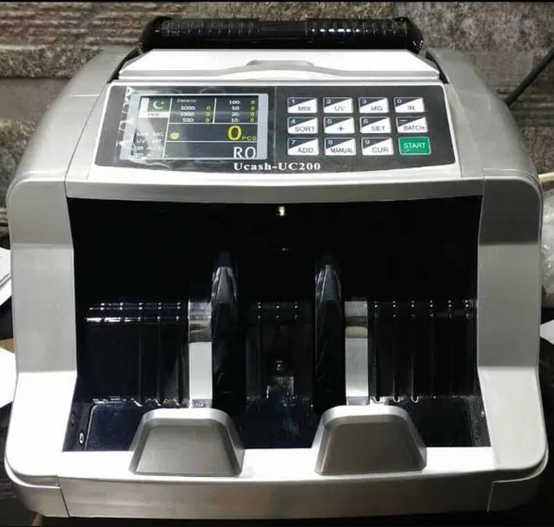 CASH NOTES COUNTING MACHINE 1