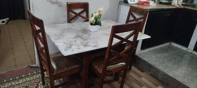 4 seater wooden dining table with marble top