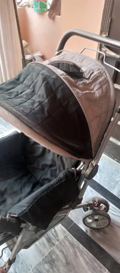 Pram for sale in reasonable price urgent sale good condition